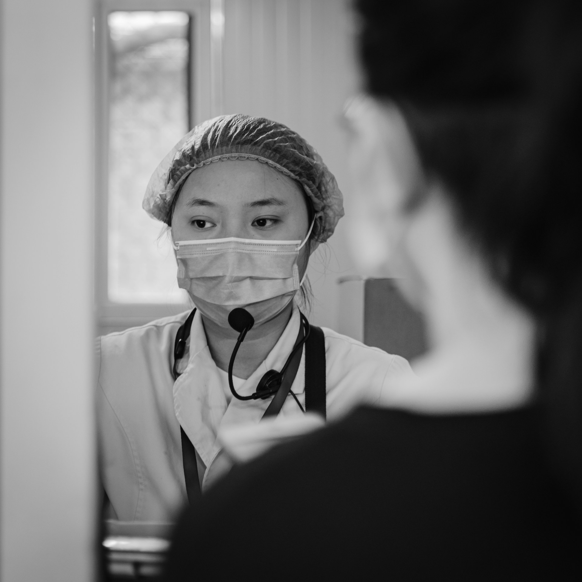 Healthcare professional reflecting on patient care